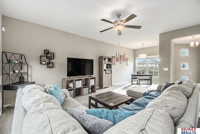 10202 N 152nd Ave, Bennington, NE 68007 - living room with light carpet, a ceiling fan, and baseboards