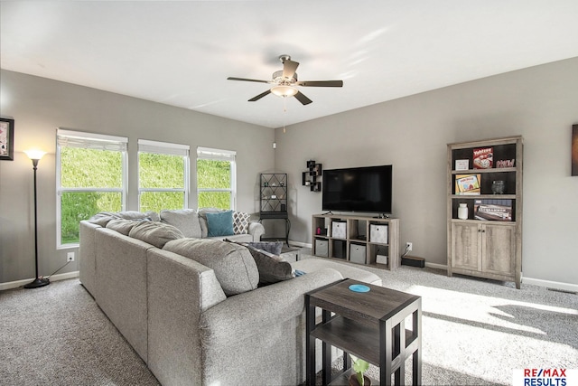 10202 N 152nd Ave, Bennington, NE 68007 - living area with ceiling fan, light carpet, and baseboards