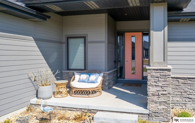 7316 Gerald Ave, Lincoln, NE 68516 - entrance to property featuring covered porch and stone siding