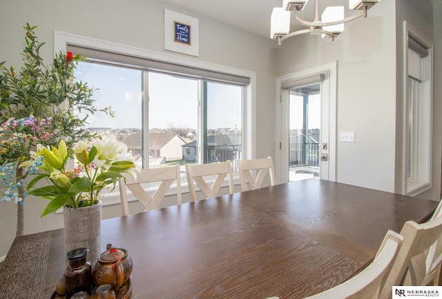 7316 Gerald Ave, Lincoln, NE 68516 - dining room with plenty of natural light and a chandelier