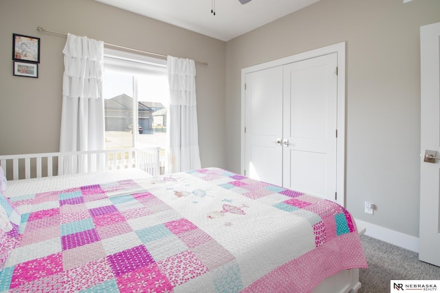 7316 Gerald Ave, Lincoln, NE 68516 - carpeted bedroom featuring a closet, a ceiling fan, and baseboards