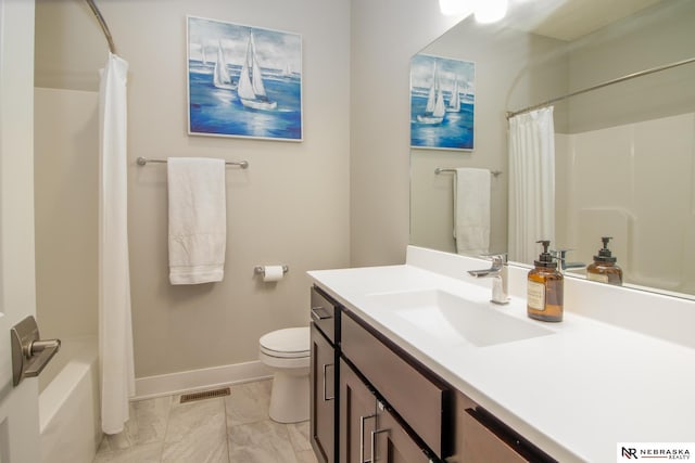 7316 Gerald Ave, Lincoln, NE 68516 - full bath featuring marble look tiles, baseboards, vanity, toilet, and shower / bathtub combination with curtain