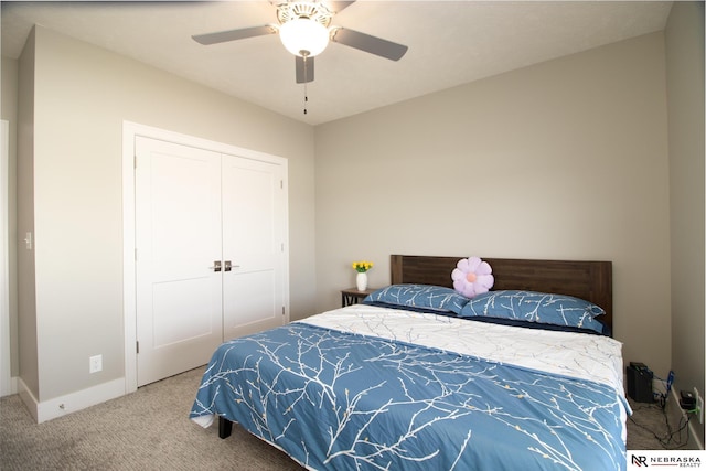 7316 Gerald Ave, Lincoln, NE 68516 - carpeted bedroom featuring a ceiling fan, a closet, and baseboards