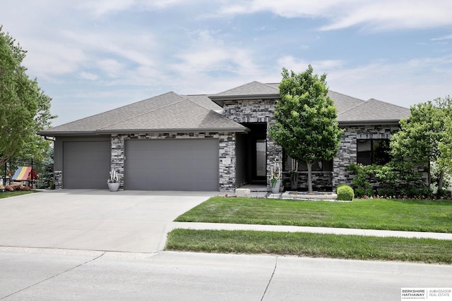 1611 S 208th St, Omaha, NE 68022 - view of front of house featuring a garage, driveway, a front yard, stone siding, and roof with shingles