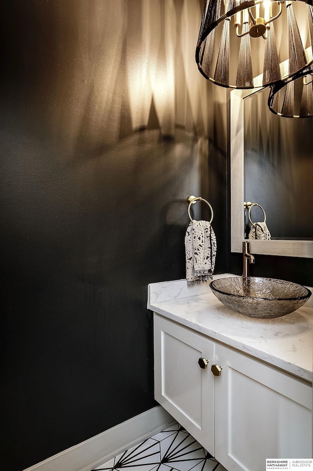 1611 S 208th St, Omaha, NE 68022 - bathroom featuring vanity and a chandelier
