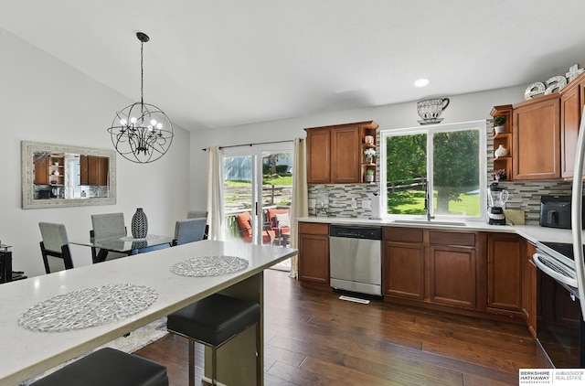 5135 N 159th Cir, Omaha, NE 68116 - kitchen featuring appliances with stainless steel finishes, open shelves, light countertops, tasteful backsplash, and lofted ceiling