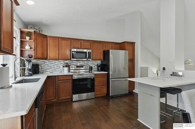 5135 N 159th Cir, Omaha, NE 68116 - kitchen with appliances with stainless steel finishes, a sink, lofted ceiling, open shelves, and tasteful backsplash