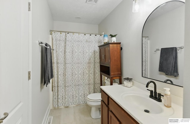 5135 N 159th Cir, Omaha, NE 68116 - bathroom with toilet, vanity, and a shower with curtain