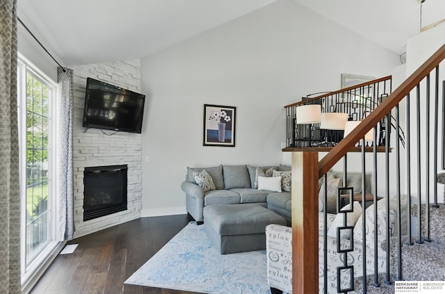 5135 N 159th Cir, Omaha, NE 68116 - living area featuring hardwood / wood-style floors, stairs, high vaulted ceiling, and a fireplace