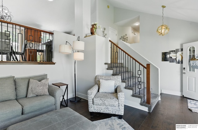 5135 N 159th Cir, Omaha, NE 68116 - living area with stairs, wood finished floors, high vaulted ceiling, and baseboards