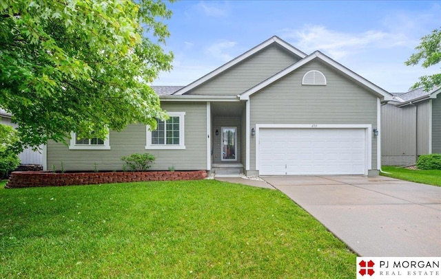 6713 N 148th St, Omaha, NE 68116 - single story home featuring concrete driveway, a garage, and a front lawn