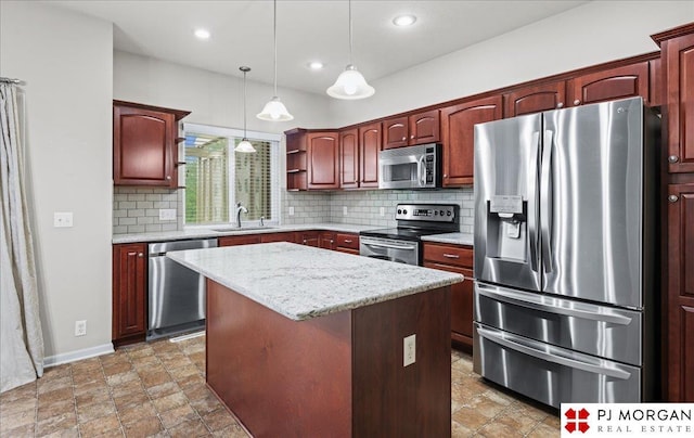 6713 N 148th St, Omaha, NE 68116 - kitchen featuring stainless steel appliances, tasteful backsplash, a kitchen island, hanging light fixtures, and recessed lighting