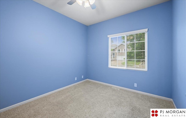 6713 N 148th St, Omaha, NE 68116 - carpeted spare room with a ceiling fan and baseboards
