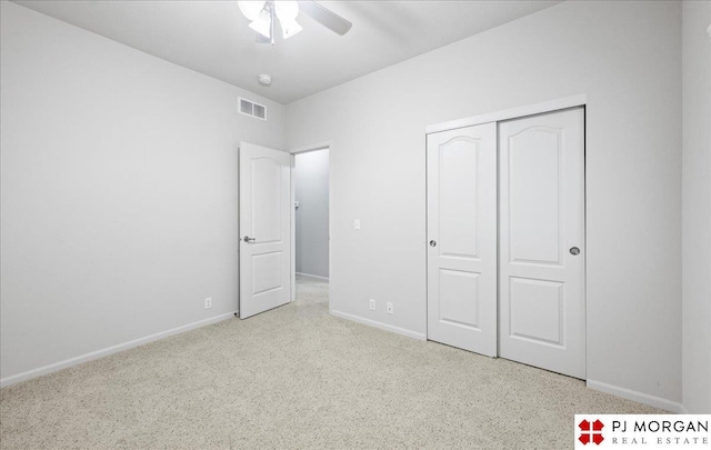 6713 N 148th St, Omaha, NE 68116 - unfurnished bedroom featuring a closet, carpet floors, and a ceiling fan