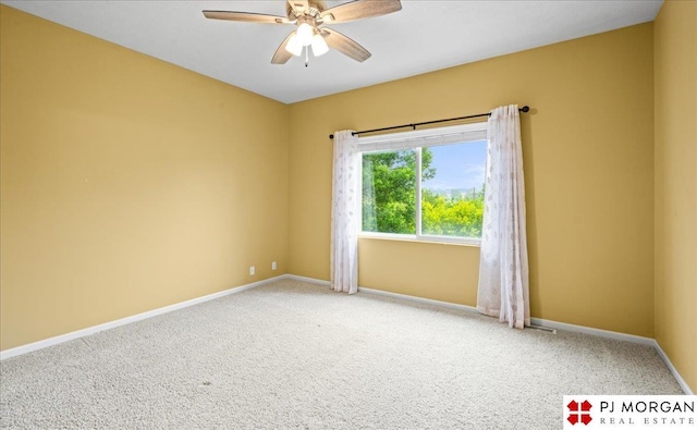 6713 N 148th St, Omaha, NE 68116 - carpeted spare room featuring ceiling fan and baseboards