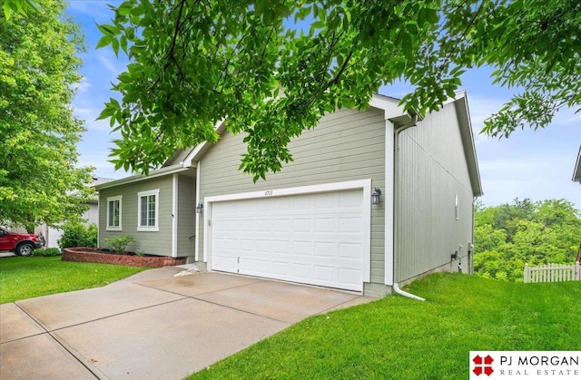 6713 N 148th St, Omaha, NE 68116 - view of front of house with an attached garage and driveway