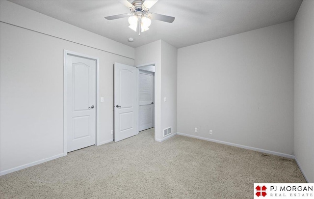 6713 N 148th St, Omaha, NE 68116 - unfurnished bedroom featuring carpet and a ceiling fan