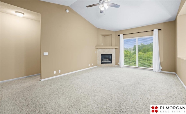 6713 N 148th St, Omaha, NE 68116 - unfurnished living room featuring ceiling fan, lofted ceiling, a fireplace, and carpet flooring