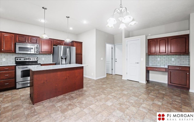 6713 N 148th St, Omaha, NE 68116 - kitchen featuring stainless steel appliances, a center island, tasteful backsplash, hanging light fixtures, and a chandelier