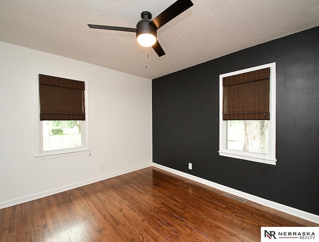 2000 N 53rd St, Lincoln, NE 68504 - spare room with a ceiling fan and wood finished floors
