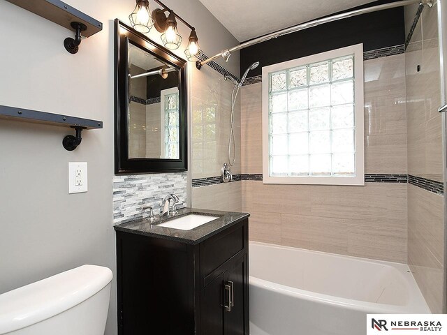 2000 N 53rd St, Lincoln, NE 68504 - full bath featuring tub / shower combination, vanity, and backsplash