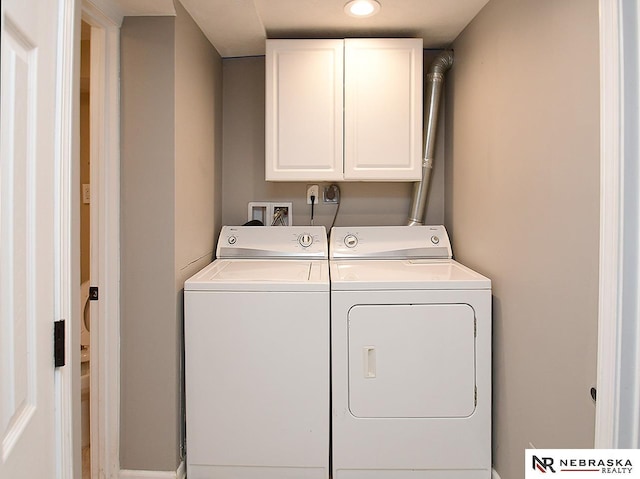 2000 N 53rd St, Lincoln, NE 68504 - washroom featuring separate washer and dryer and cabinet space