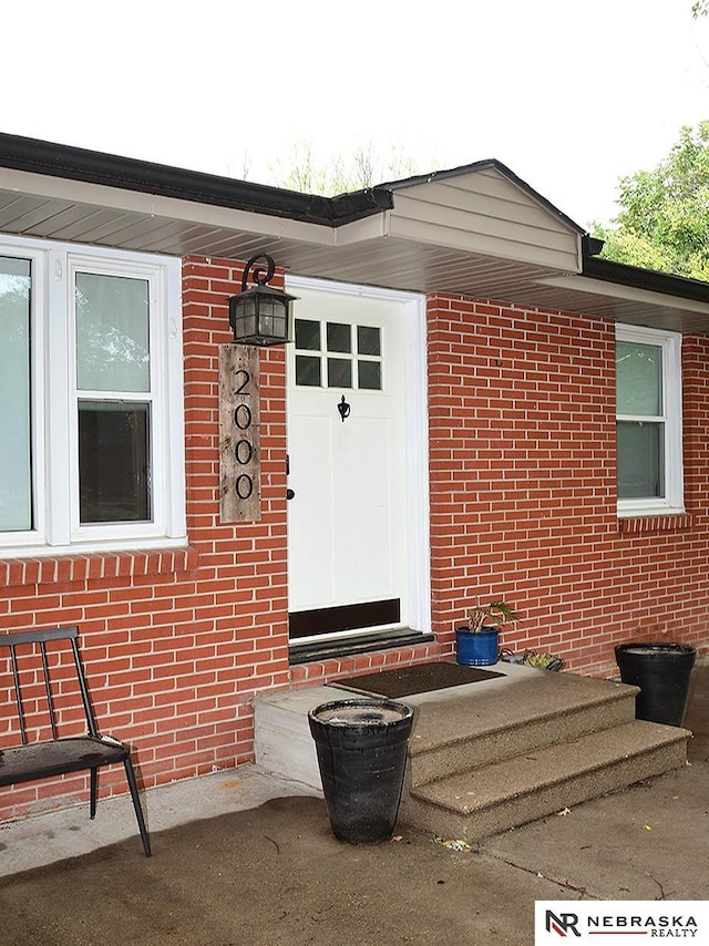 2000 N 53rd St, Lincoln, NE 68504 - property entrance featuring brick siding