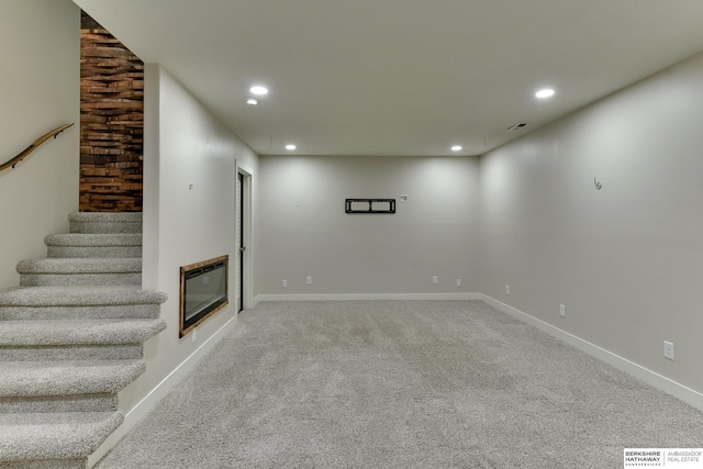 18337 Polk St, Omaha, NE 68135 - below grade area featuring heating unit, recessed lighting, stairs, carpet, and baseboards