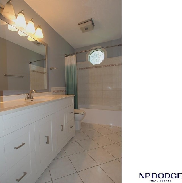 5807 S 136th St, Omaha, NE 68137 - bathroom featuring tile patterned flooring, vanity, toilet, and shower / bath combination with curtain