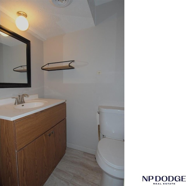 5807 S 136th St, Omaha, NE 68137 - half bath with toilet, vanity, and baseboards