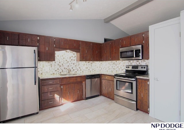 5807 S 136th St, Omaha, NE 68137 - kitchen featuring appliances with stainless steel finishes, a sink, decorative backsplash, and light stone counters