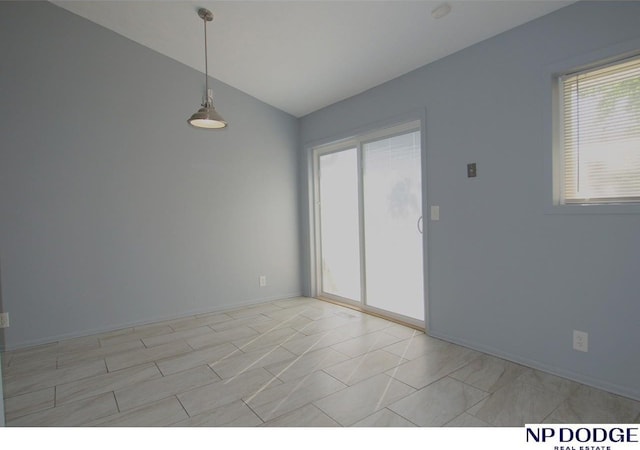 5807 S 136th St, Omaha, NE 68137 - empty room featuring vaulted ceiling and baseboards