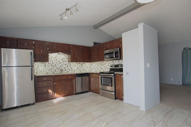 5807 S 136th St, Omaha, NE 68137 - kitchen featuring appliances with stainless steel finishes, decorative backsplash, light countertops, and a sink