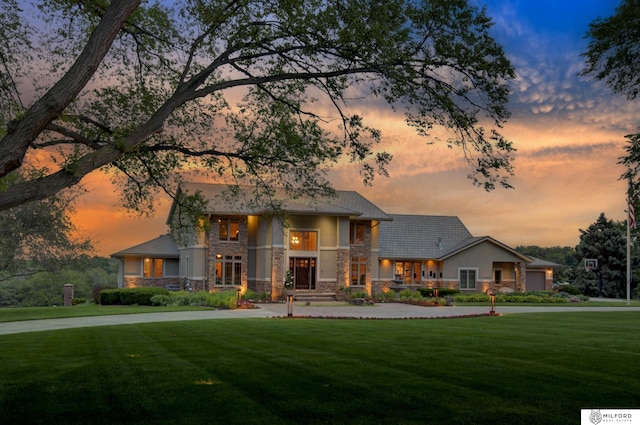 4725 S 184th Plz, Omaha, NE 68135 - view of front of property with stone siding and a lawn
