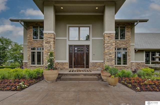 4725 S 184th Plz, Omaha, NE 68135 - view of exterior entry featuring stone siding and stucco siding