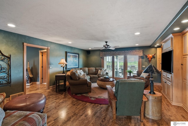 4725 S 184th Plz, Omaha, NE 68135 - living room featuring wood finished floors, recessed lighting, a ceiling fan, baseboards, and a textured ceiling