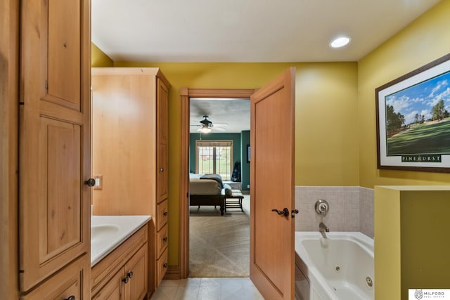 4725 S 184th Plz, Omaha, NE 68135 - bathroom with a tub with jets, vanity, tile patterned floors, and ensuite bathroom