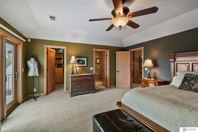 4725 S 184th Plz, Omaha, NE 68135 - bedroom with light colored carpet, a walk in closet, vaulted ceiling, access to outside, and baseboards
