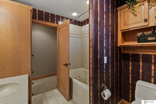 4725 S 184th Plz, Omaha, NE 68135 - bathroom featuring wallpapered walls, baseboards, toilet, a combined bath / shower with jetted tub, and vanity