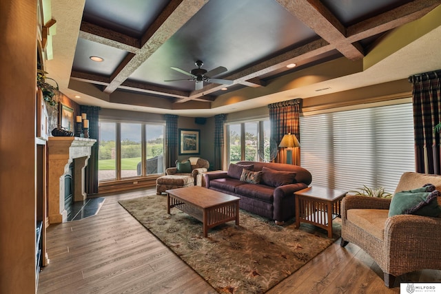 4725 S 184th Plz, Omaha, NE 68135 - living room featuring coffered ceiling, a ceiling fan, wood-type flooring, plenty of natural light, and beam ceiling