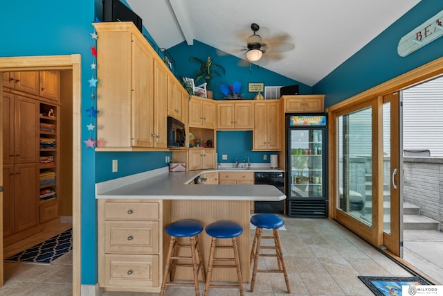 4725 S 184th Plz, Omaha, NE 68135 - kitchen with black appliances, light brown cabinetry, beverage cooler, ceiling fan, and a sink
