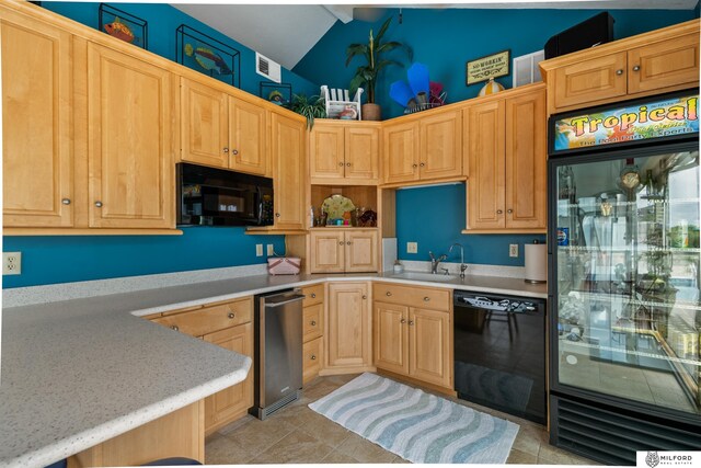 4725 S 184th Plz, Omaha, NE 68135 - kitchen with black appliances, a sink, light countertops, lofted ceiling, and light brown cabinets