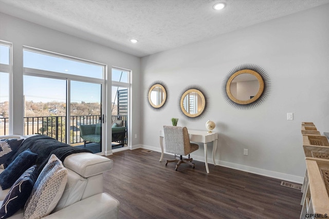 630 N 46th St, Omaha, NE 68132 - office space featuring a textured ceiling, dark wood-type flooring, baseboards, and recessed lighting