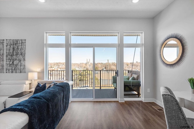 630 N 46th St, Omaha, NE 68132 - living area featuring wood finished floors, recessed lighting, and baseboards