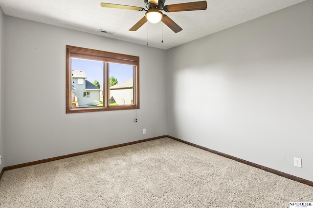 19677 Lamont St, Omaha, NE 68130 - empty room featuring carpet flooring, ceiling fan, and baseboards
