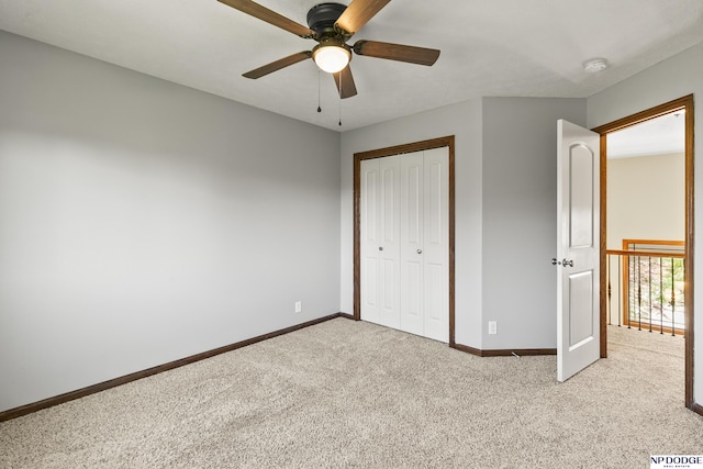 19677 Lamont St, Omaha, NE 68130 - unfurnished bedroom featuring carpet floors, baseboards, a closet, and ceiling fan