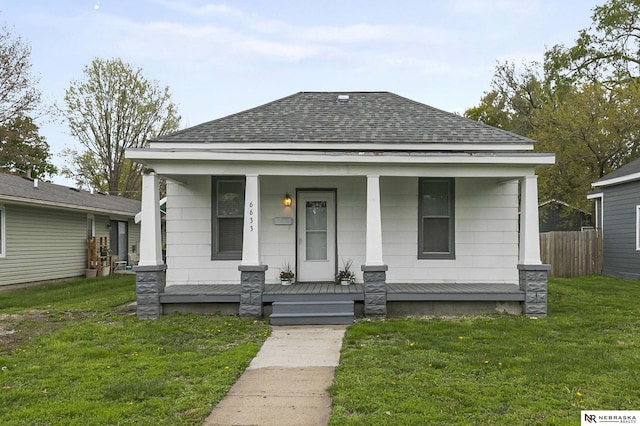 6633 Platte Ave, Lincoln, NE 68507 - view of front of house featuring a shingled roof and covered porch
