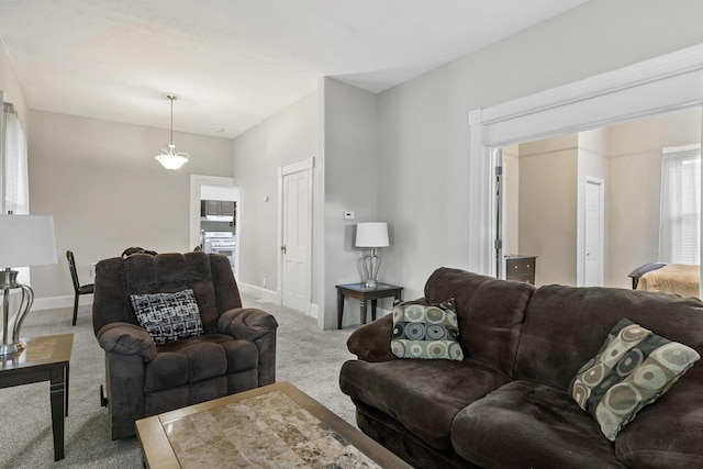6633 Platte Ave, Lincoln, NE 68507 - carpeted living area with plenty of natural light and baseboards