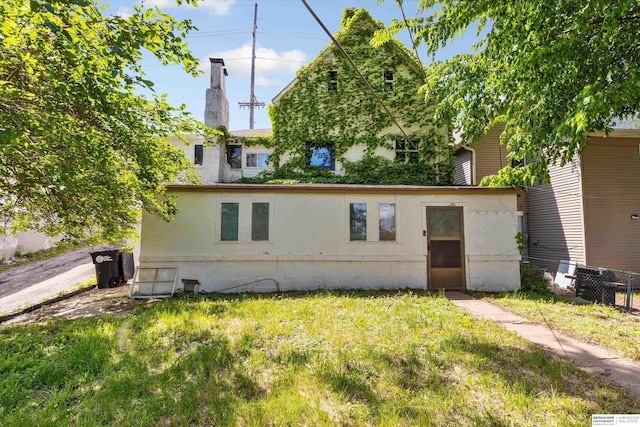 712 Bancroft St, Omaha, NE 68108 - view of front of property with a chimney