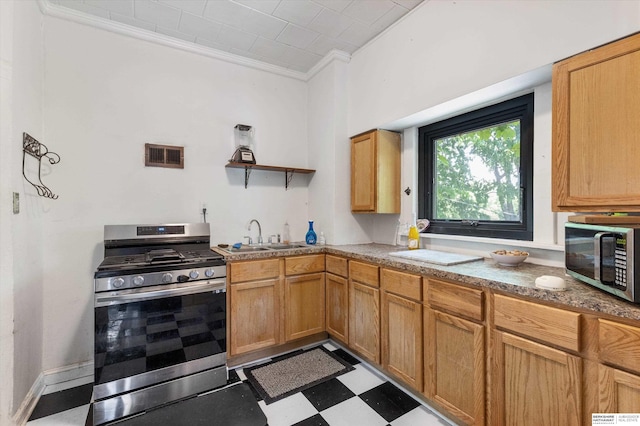 712 Bancroft St, Omaha, NE 68108 - kitchen featuring appliances with stainless steel finishes, open shelves, tile patterned floors, ornamental molding, and a sink